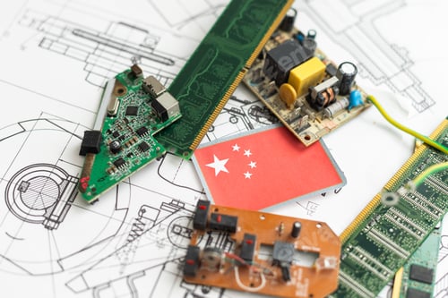 Preview: Group of electronic components with schematics in the background