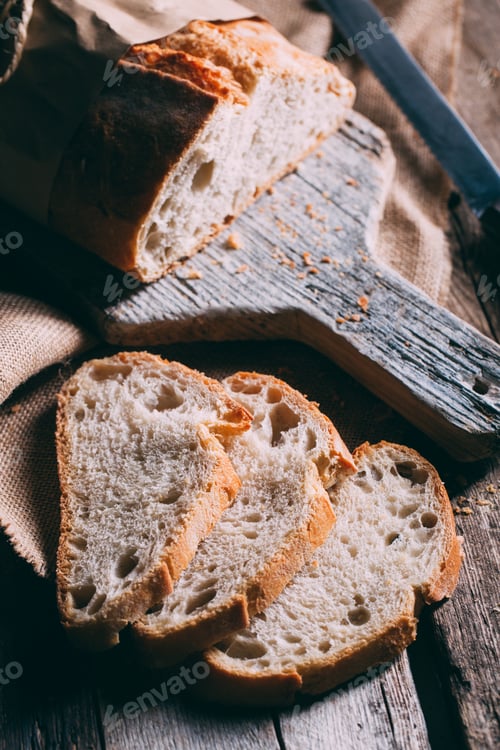 Preview: Rustic bread loaf on dark background