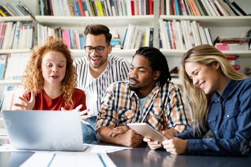 Preview: Group of successful business people designers architects in office