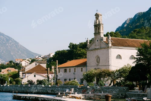 Preview: Facade of the Church of St. Nicholas with a bell tower in Prcanj on the shore of the Bay of Kotor