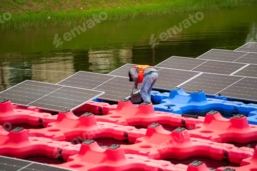 Preview: Technicians installing photovoltaic solar panels
