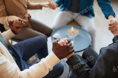 Preview: People Holding Hands in Support Group Background