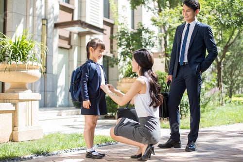 Preview: Parents taking their child to school in the morning