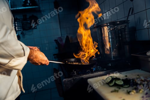 Preview: Chef cooking in a commercial kitchen.