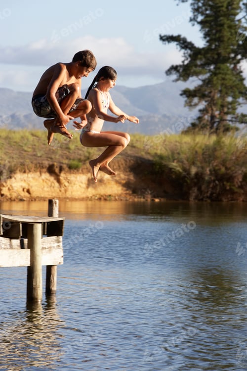 Preview: Two Children Jumping From Jetty Into Lake