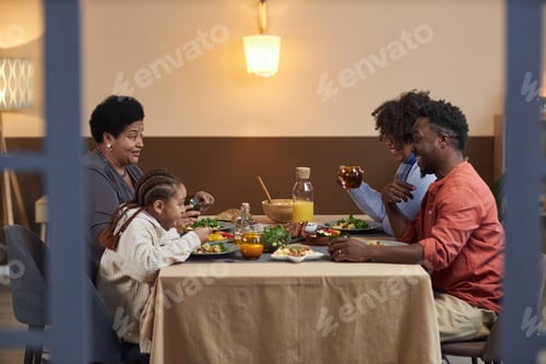 Preview: Three Generation Black Family at Table