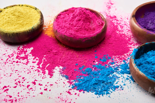Preview: wooden bowls with multicolored holi powder on white background