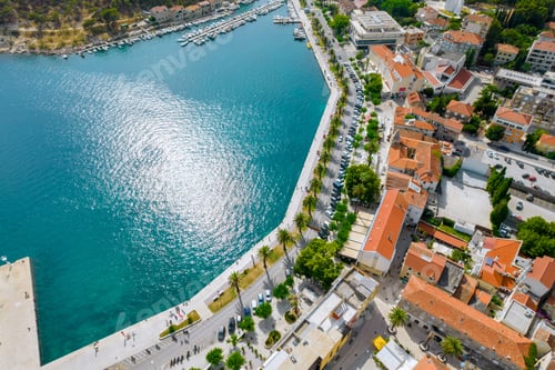 Preview: Embankment by the sea and hotels for tourists in the resort town. View from above.