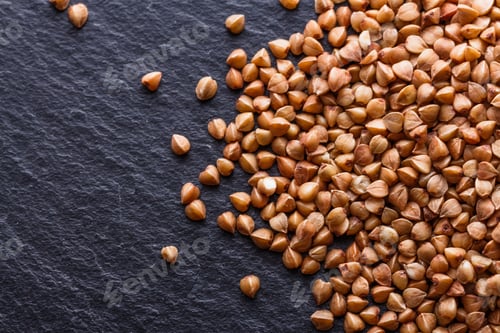 Preview: Grain buckwheat on a dark stone background