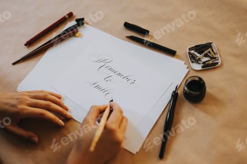 Preview: Image of a beautifully hand written remember to smile.