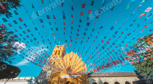 Preview: Low angle shot of the colorful pennants in front of the Saint Dominic's temple