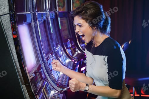 Preview: Woman is happy of her win in slot machines