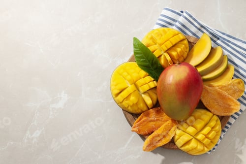 Preview: Ripe delicious mango on a white table