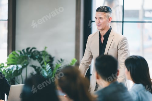 business partners meeting in modern office, coworking space