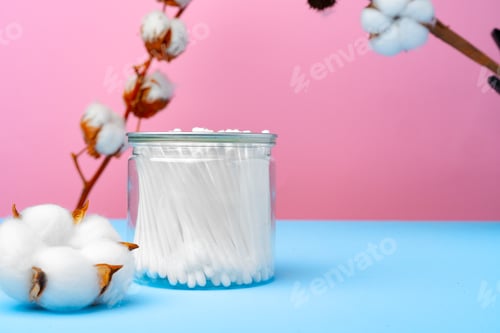 Preview: Cotton buds for cleaning ears on pink and blue background