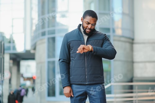 Preview: African American man in stylish new clothes on the street