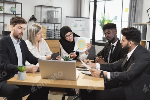 Preview: Business people having video call on laptop at office