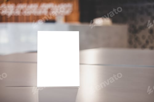 Preview: blank menu frame on table in coffee shop stand for your text of display your product