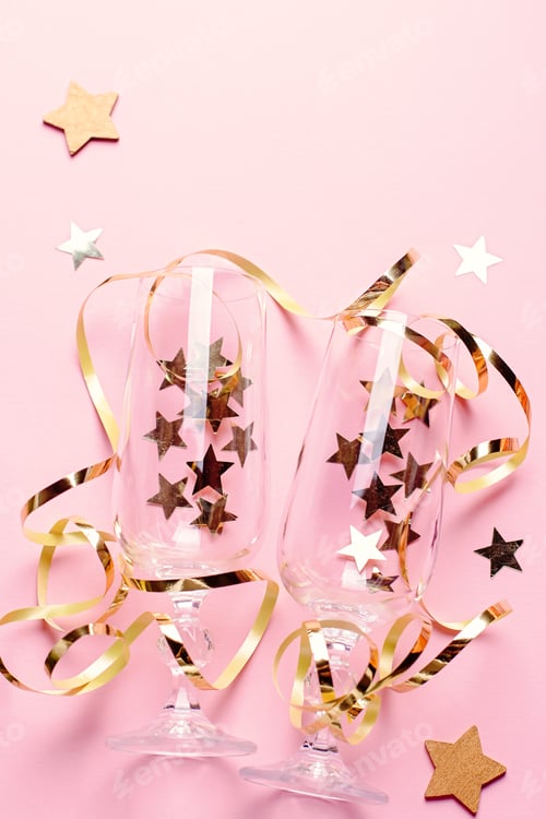 Preview: Christmas card with champagne glasses with confetti and streamers