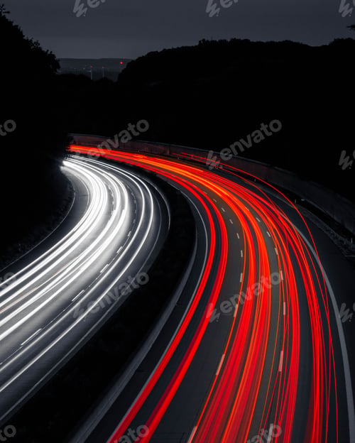 Preview: Vertical shot of a highway at night with long exposure lights