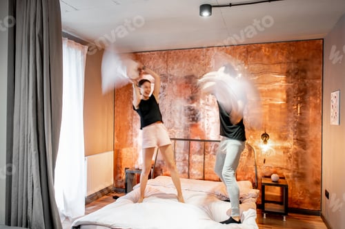 Preview: Modern bedroom with blurred woman