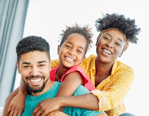 Preview: Happy Family Smiling Together in Bright Indoor Setting