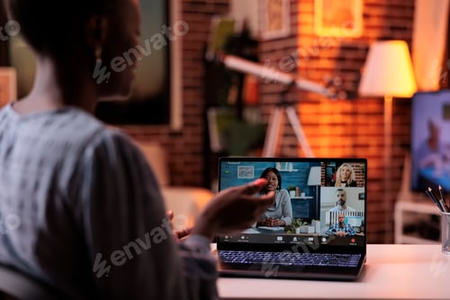 Preview: Company team lead attending online business meeting with employees