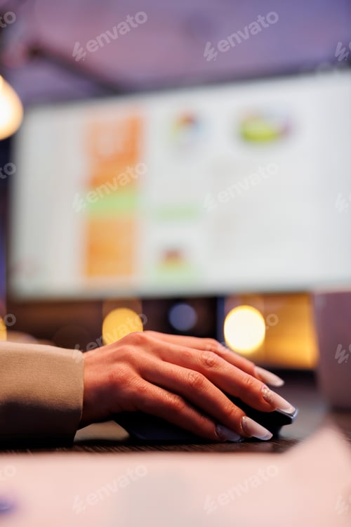 Preview: Businesswoman sitting at desk table analyzing marketing statistics