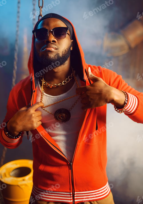 Preview: Rapper in red hoodie and sunglasses in studio