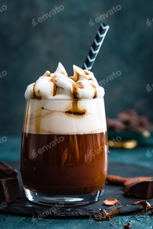 Preview: Hot chocolate with whipped cream. Chocolate dessert drink in glass