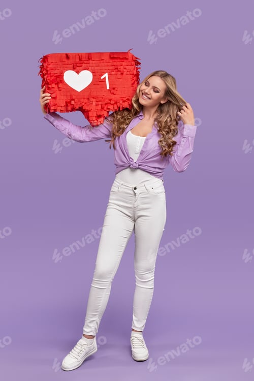 Preview: Cheerful woman with social media banner adjusting hair