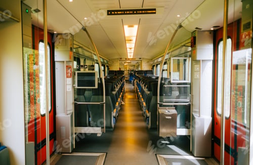 Preview: Interior detail of German regional train, large windows and empty seats