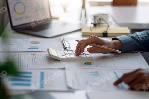 Preview: Close up bhand of businessman or bookkeeper working in finance and accounting analyze financial