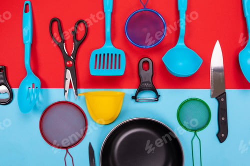 Preview: Kitchen utensils isolated on red-blue background