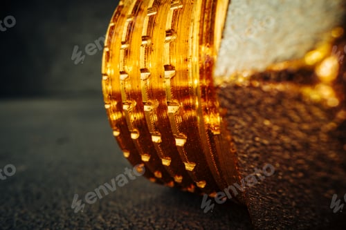 Preview: Metal golden water pipe fitting piece macro