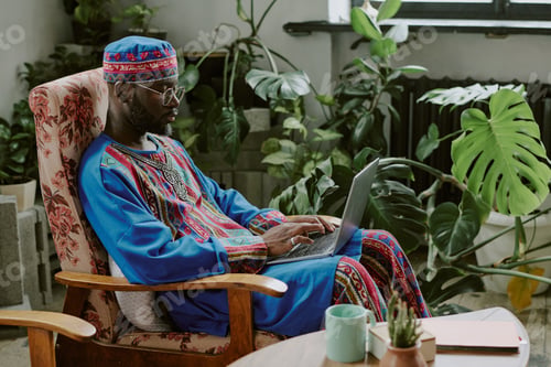 Preview: Man Using Laptop