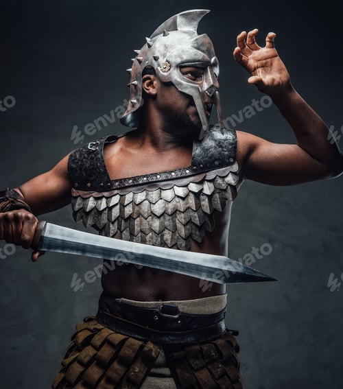 Preview: Proud antique gladiator with sword against dark background