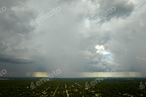 Preview: Landscape of dark ominous clouds forming on stormy sky during heavy thunderstorm