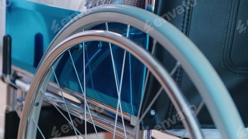 Preview: Close up of rolling wheelchair