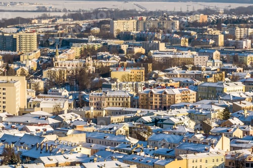 Preview: winter panoramic aerial view of a huge residential complex with high-rise buildings with snow