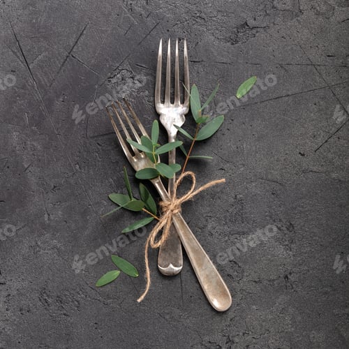 Preview: Vintage Silverware Collection with Rustic Elements on Dark Stone Background
