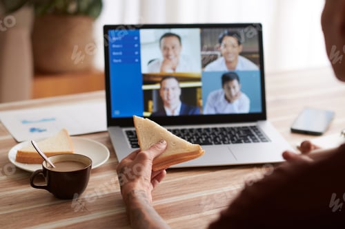 Preview: Man Eating During Online Meeting