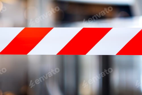 Preview: Red and white warning tape stretched across danger area in the building