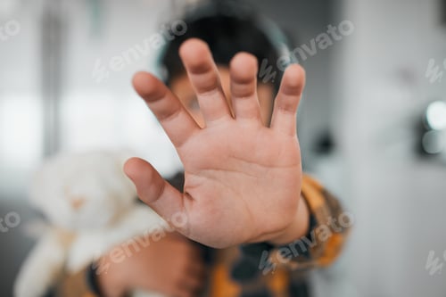 Preview: Child, stop and hand closeup for protest, rejection and sign for prohibition of domestic violence.