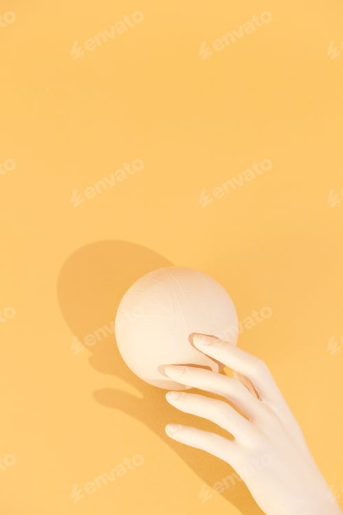 Minimal aesthetic still life monochrome design. Pastel trends. Circle geometry and hand