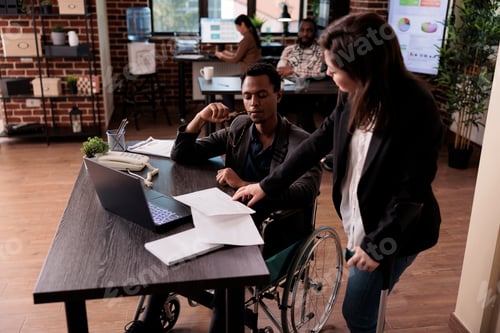 Preview: People with physical health condition doing teamwork in startup office