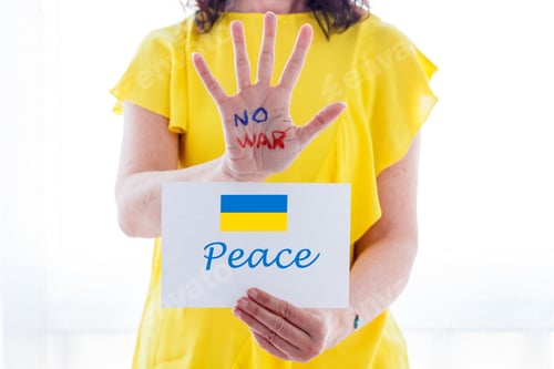 Preview: Slogan no war and Ukraine flag painted in female hands, stop war, peace, war Russia, protest