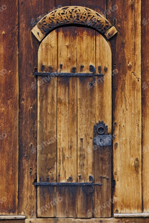 Preview: Lom medieval stave church door detail. Viking symbol. Norway tourism