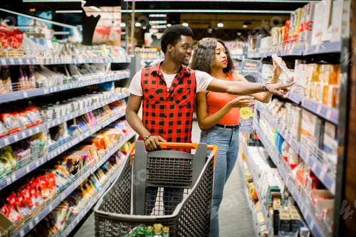 Preview: Customer In Queue To Pay For Shopping At Supermarket Checkout