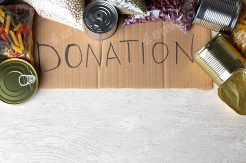 Preview: Food donations on the table. Text Donation.